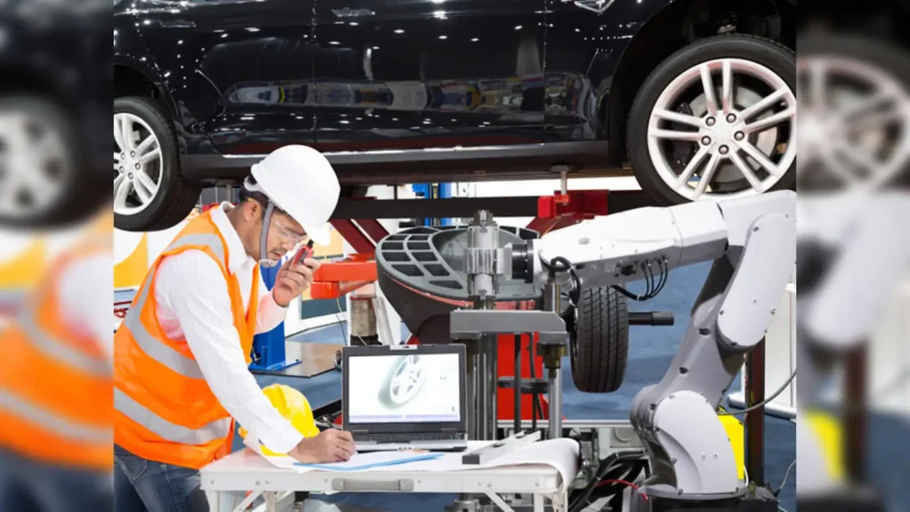 "Mechanical engineers working in Indian automotive factory"